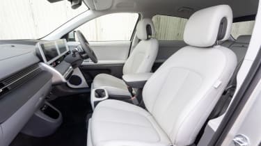 Toyota bZ4X vs Volkswagen ID.4 vs Hyundai Ioniq 5: Hyundai Ioniq 5 interior (passenger door view)